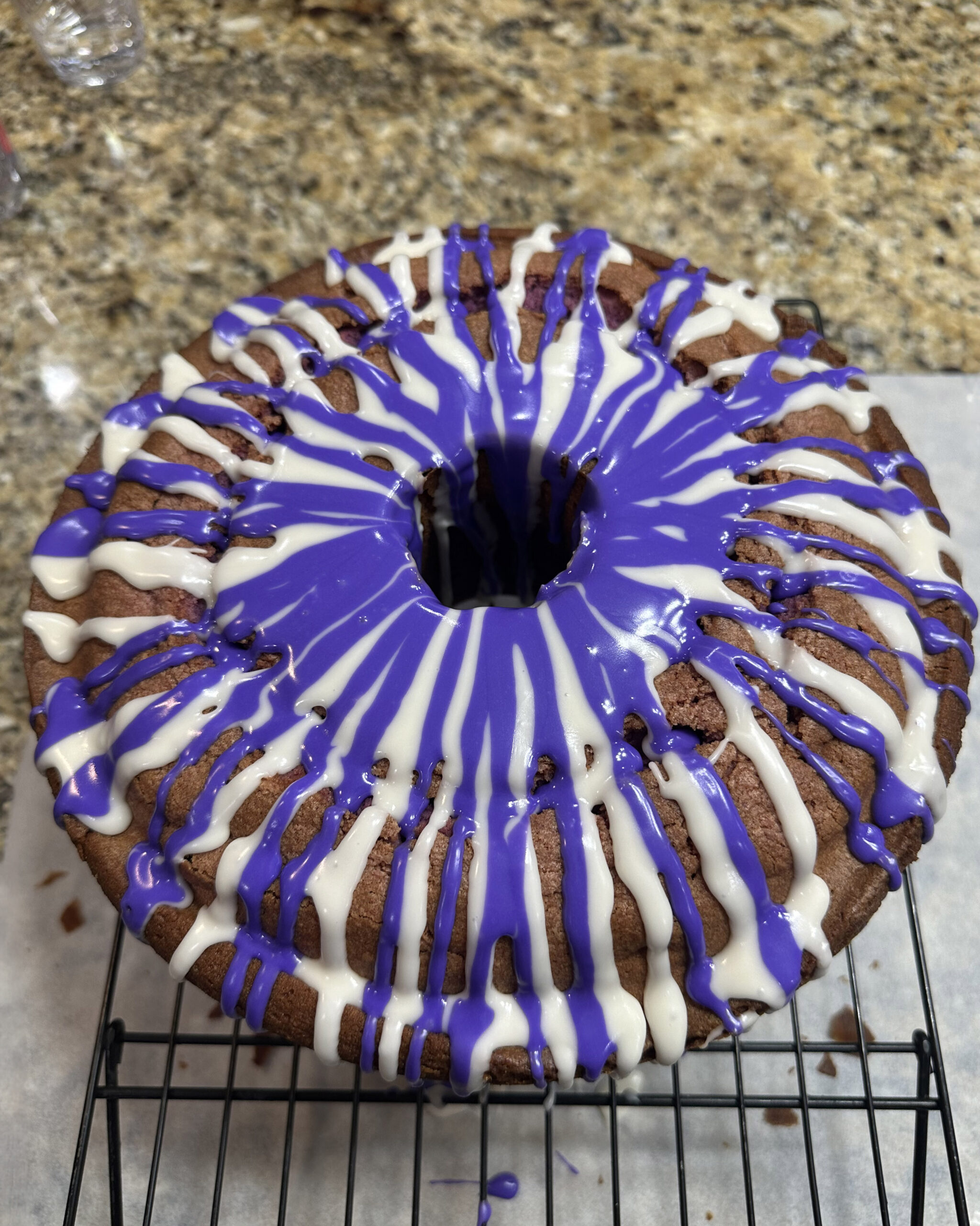 purple sweet potato pound cake with purple and white glaze