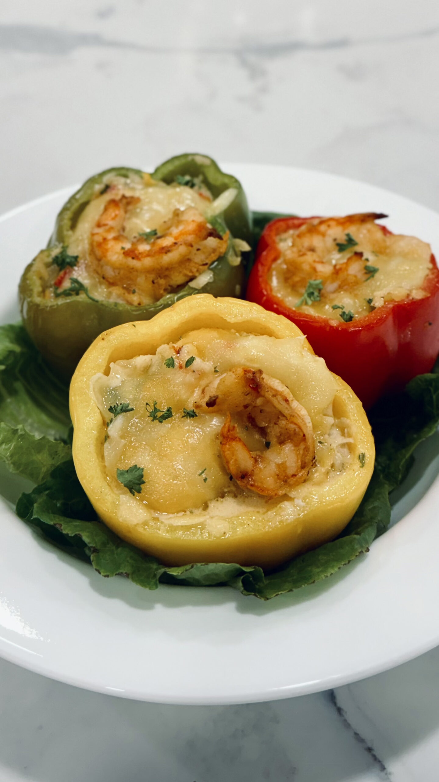 tri-colored peppers stuffed with seafood rice and cheese