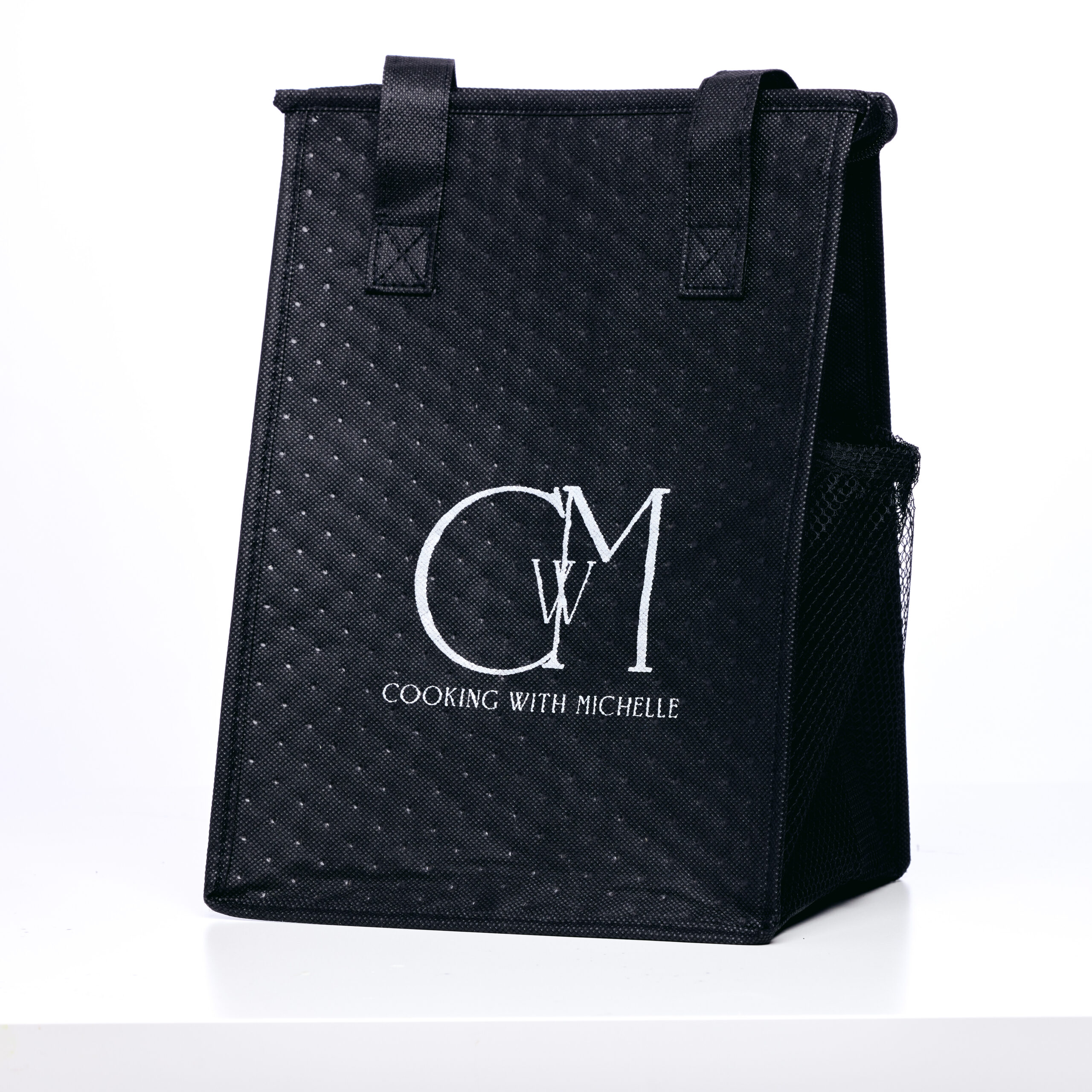 black cooler bag on white background